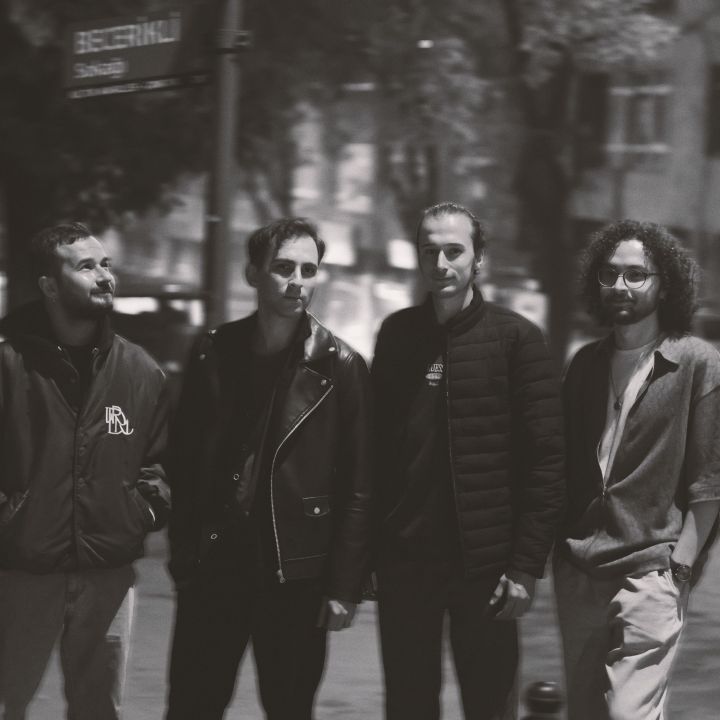 studio portrait red light black background